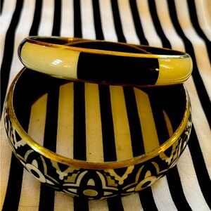 Black and gold bangles, very pretty and stylish. Excellent condition